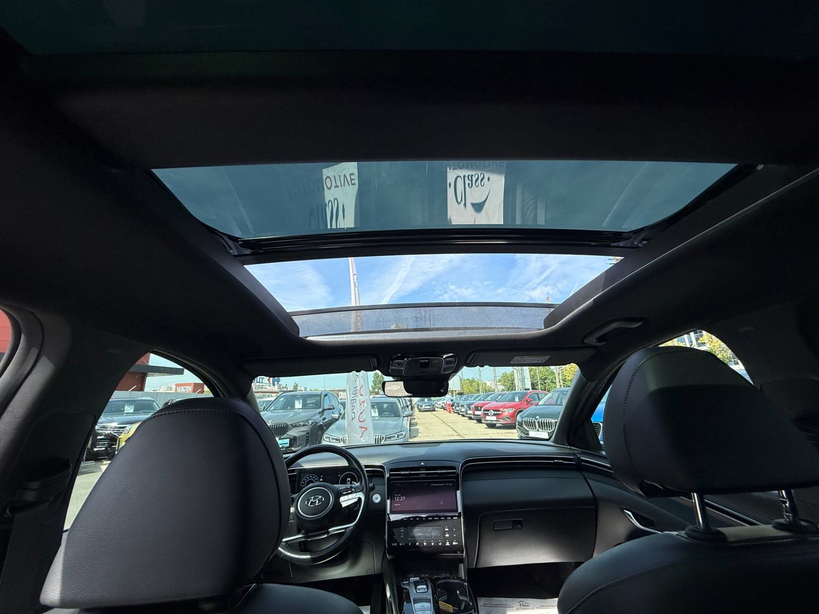 Hyundai TUCSON 2021 1.6 l 215 CP 4WD 6AT HEV Luxury - foto 19