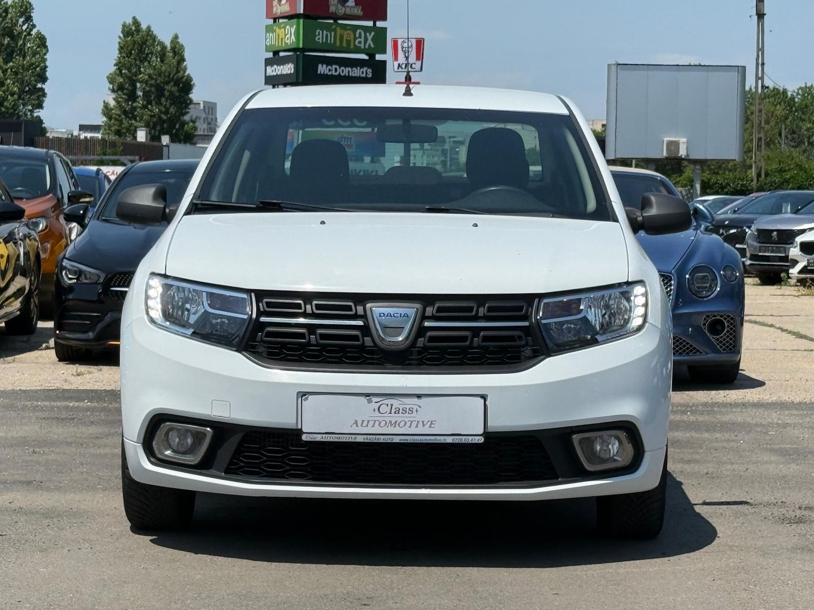 Dacia Logan 1.5 diesel 75 cai - foto 2