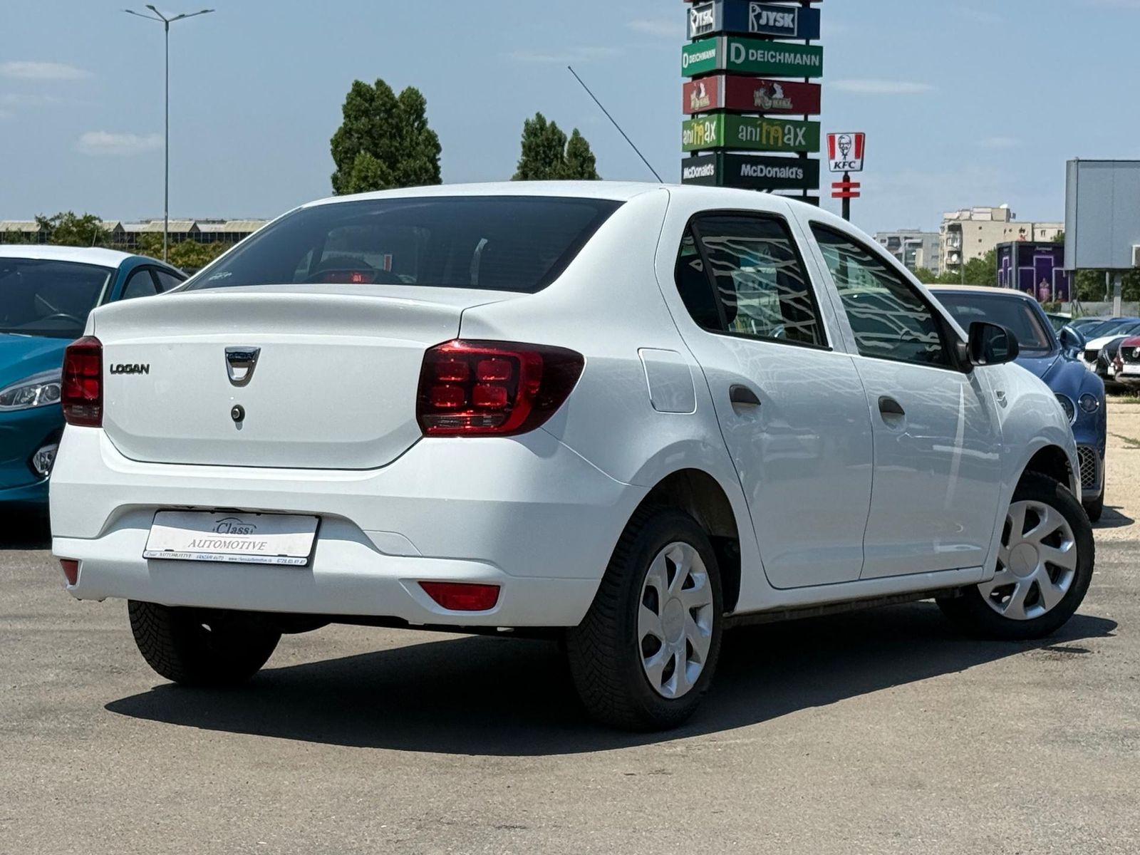 Dacia Logan 1.5 diesel 75 cai - foto 10