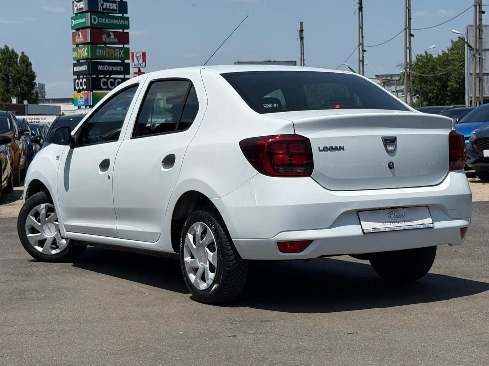 Dacia Logan 1.5 diesel 75 cai - foto 11